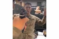 Video shows an M9 pistol being pointed at a soldier.