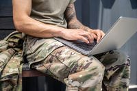 Servicemember student with laptop