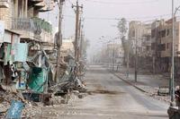 Debris-filled street of Fallujah, in central Iraq, Nov. 27, 2004