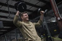 U.S. Air Force Airman 1st Class Christian Dye, a tactical air control party (TACP) specialist, works out at Joint Base Elmendorf-Richardson, Alaska.