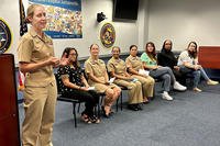 Cmdr. Chantel Charais shares her personal story during an event to mark Women's Equality Day held by the Navy Medicine Readiness and Training Command Jacksonville Diversity Committee in Florida on Aug. 18, 2023. (Deidre Smith/U.S. Navy photo)
