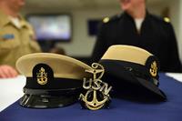 Male and female Chief Petty Officer covers