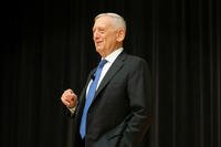 Retired Gen. and former Secretary of Defense, James Mattis, chuckles
