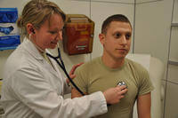 doctor gives physical examination