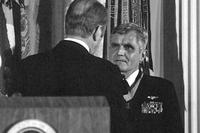 President Gerald R. Ford presents the Medal of Honor to Rear Adm. James B. Stockdale.