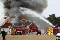 Airman helps put out fire