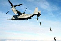 U.S. Marine Corps parachutists free fall from an MV-22 Osprey at 10,000 feet above the drop zone at Fort A.P. Hill, Va. on Jan. 17, 2000.