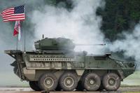 A Stryker Infantry Carrier Vehicle-Dragoon fires 30mm rounds during a live-fire demonstration at Aberdeen Proving Ground, Md., Aug. 16, 2017. (Photo Credit: Sean Kimmons)