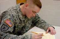 Soldier studies in a classroom