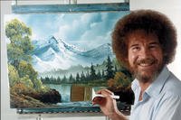 Bob Ross with a completed painting